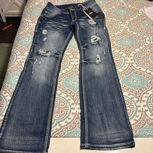 Flamingo dark wash bootcut with holes mades with alittle distressed size 7